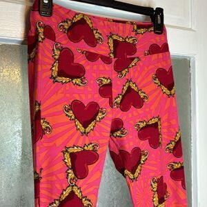 Lularoe Women’s Coral Pink gold winged Heart Patterned Casual Leggings Size OS